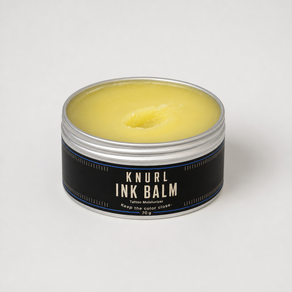A jar of Knurl Ink Balm, a whipped tallow balm for tattooed skin