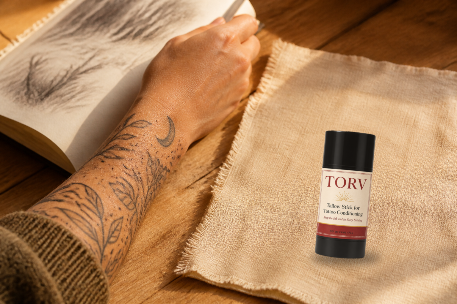 Styled lifestyle photograph of the TORV tallow stick as part of a daily carry scene