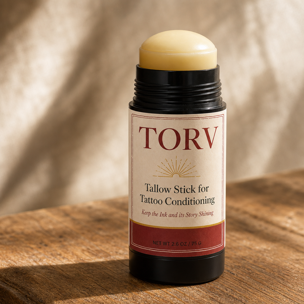 TORV tallow stick with the cap off and the balm twisted up